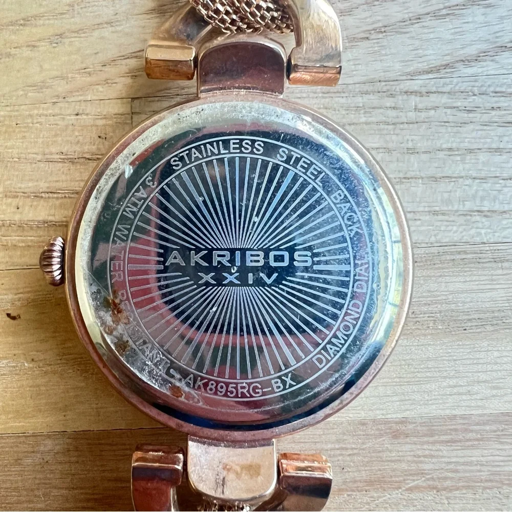 Akribos XXIV ladies rose gold tone fashion bracelet watch NEW BATTERY